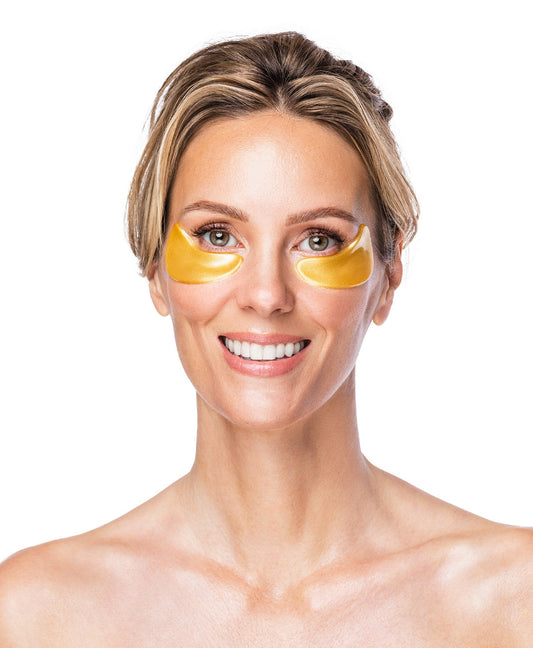 A woman using a Nano Gold Repair Collagen Eye Mask.